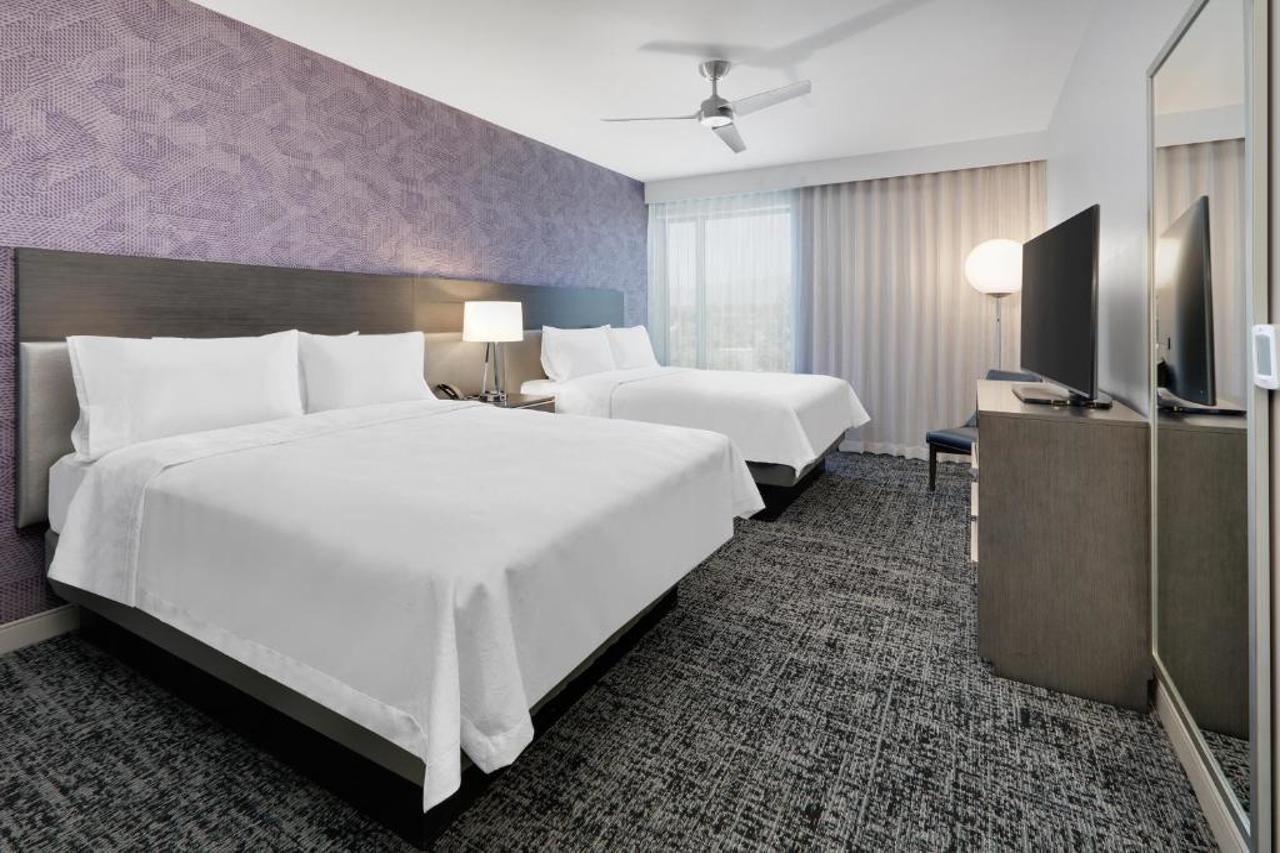 Luxe Grand Hotel Apartments Sharjah Eksteriør billede A guest room at the Hilton Garden Inn in San Francisco