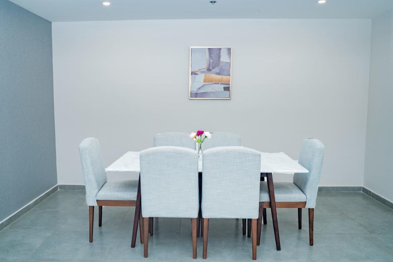 Luxe Grand Hotel Apartments Sharjah Eksteriør billede A dining room