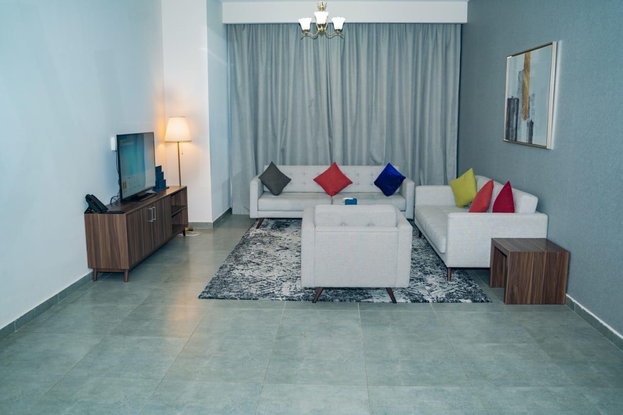 Luxe Grand Hotel Apartments Sharjah Eksteriør billede A living room