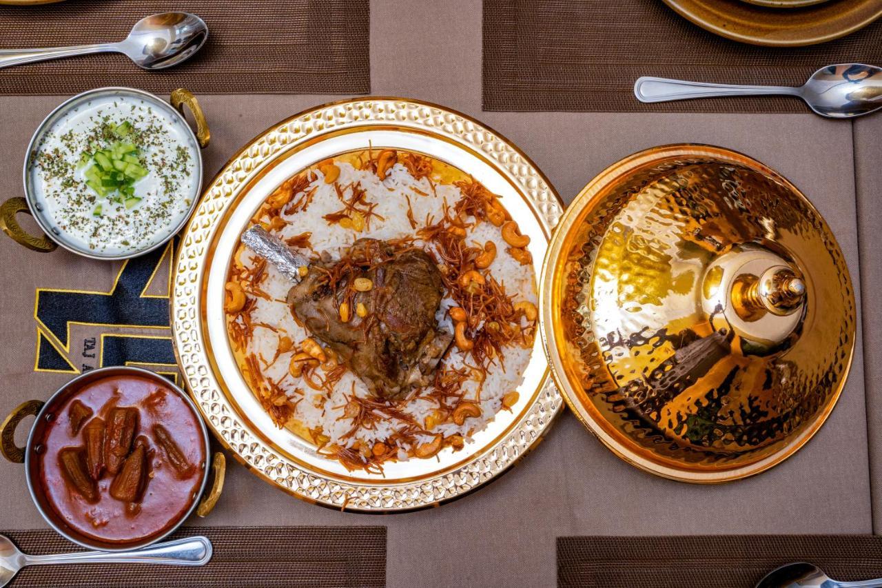 Luxe Grand Hotel Apartments Sharjah Eksteriør billede Hyderabadi biryani