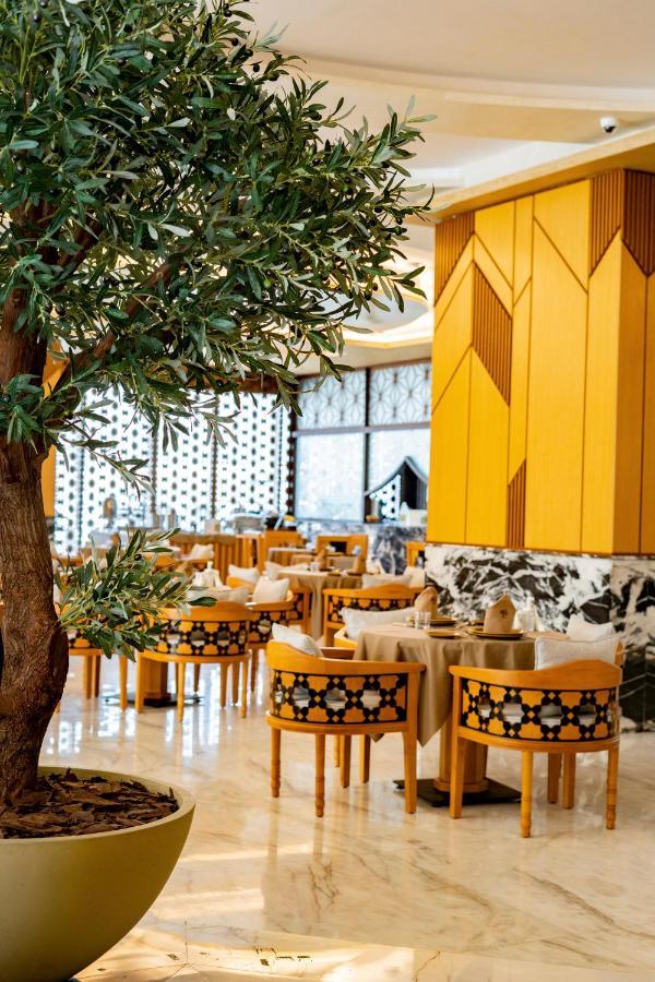Luxe Grand Hotel Apartments Sharjah Eksteriør billede The restaurant