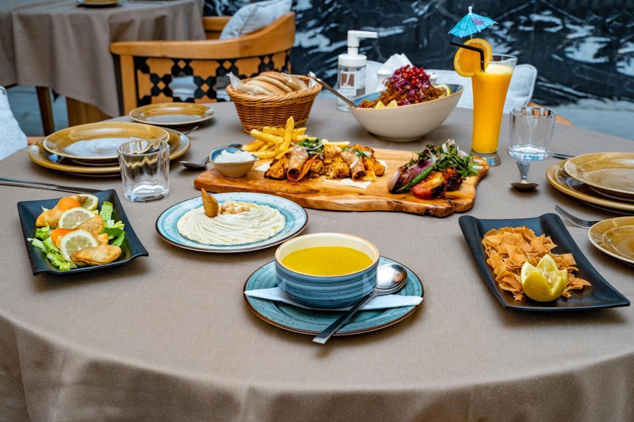 Luxe Grand Hotel Apartments Sharjah Eksteriør billede A selection of Turkish cuisine