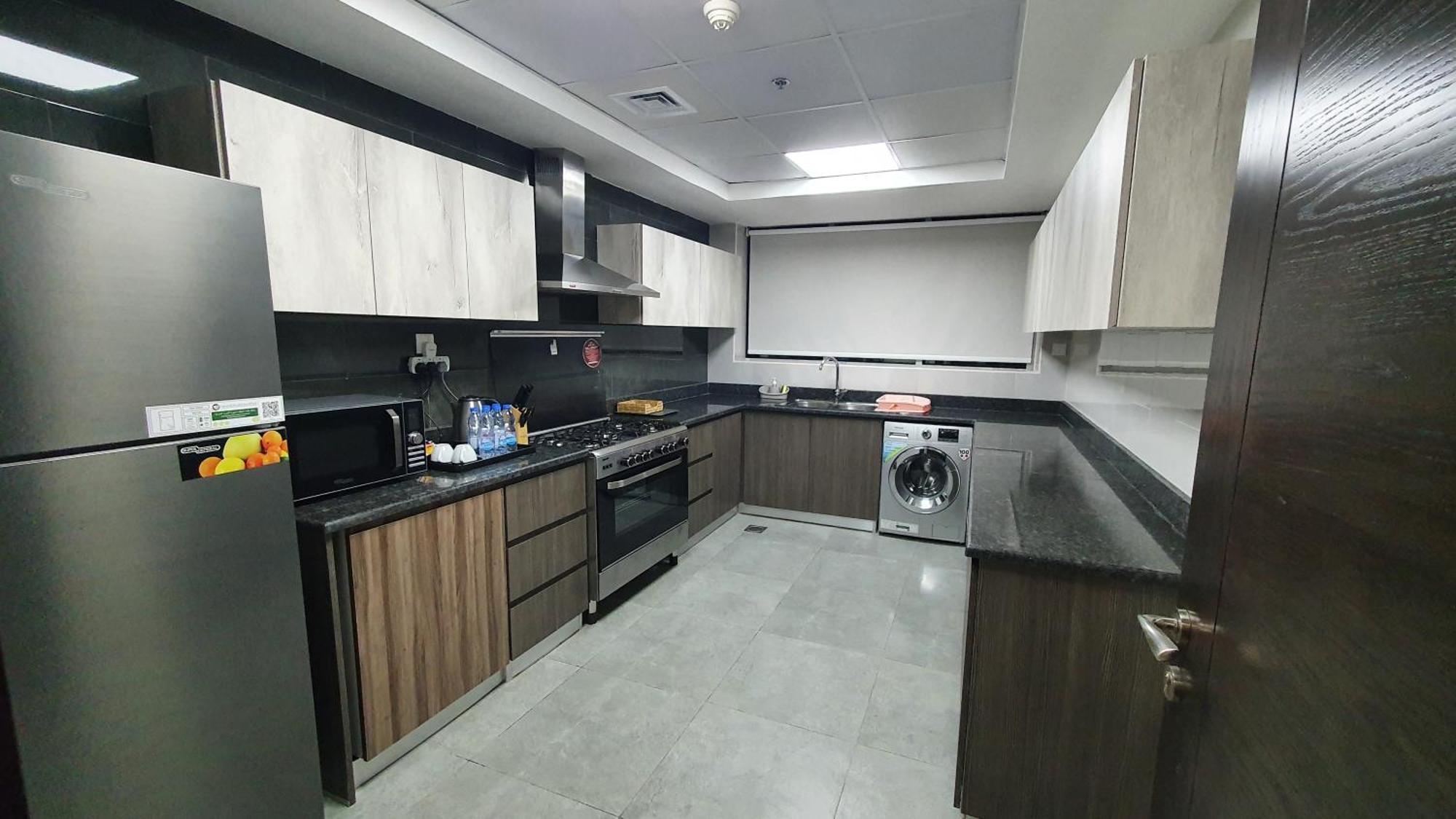 Luxe Grand Hotel Apartments Sharjah Eksteriør billede A modern kitchen in Dubai